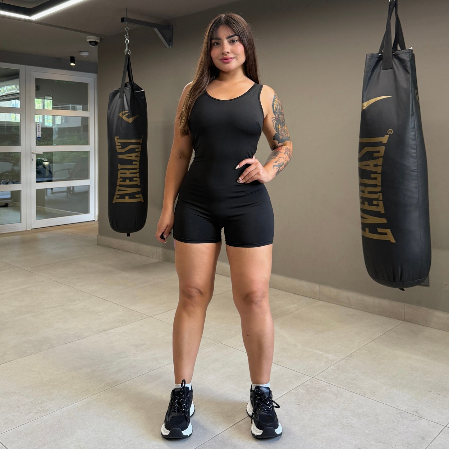 Enterito Deportivo corto sin mangas Negro