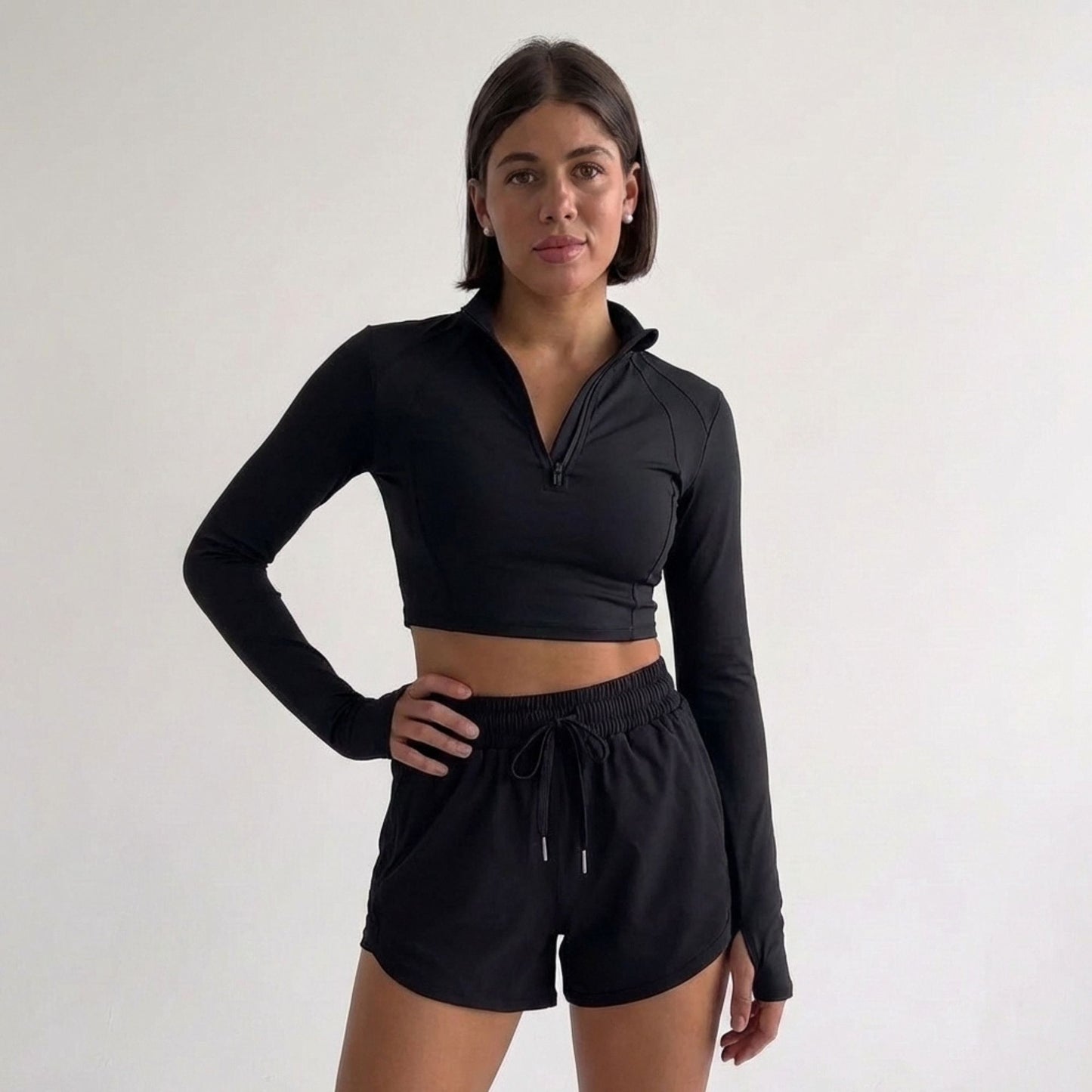 Top Peto Deportivo manga larga cuello alto con cierre