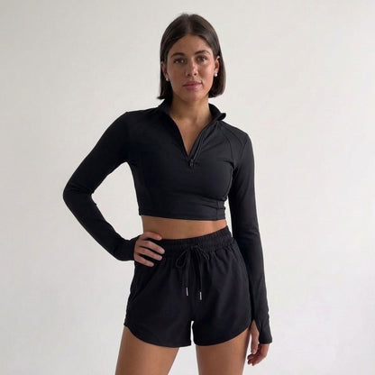Top Peto Deportivo manga larga cuello alto con cierre