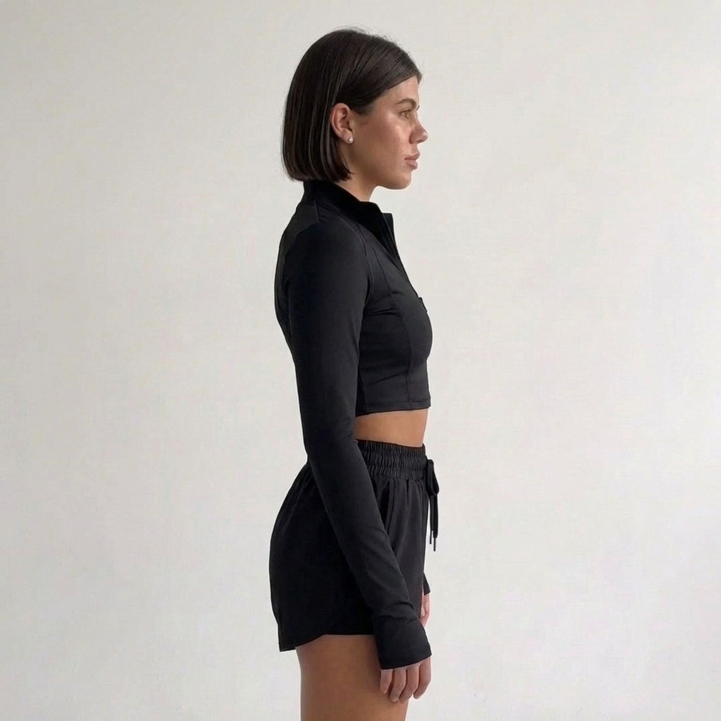 Top Peto Deportivo manga larga cuello alto con cierre