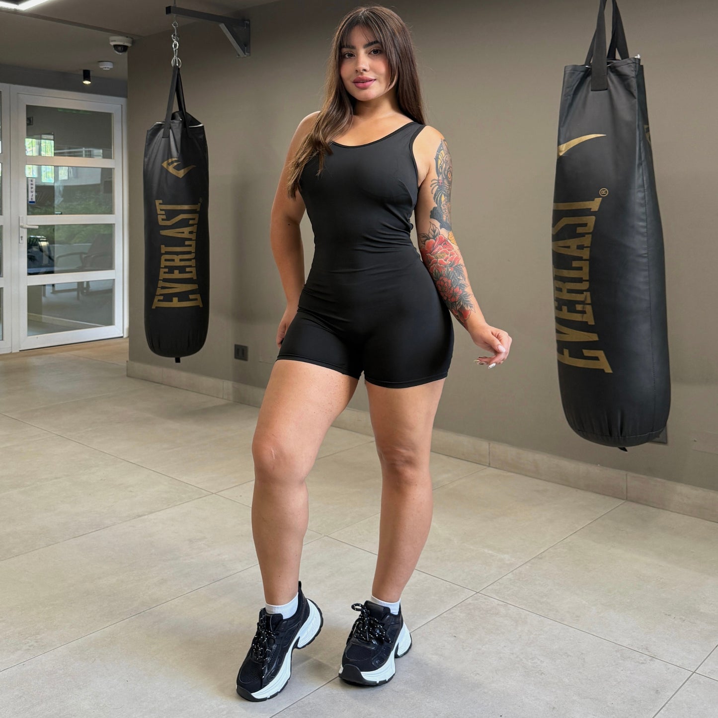 Enterito Deportivo corto sin mangas Negro